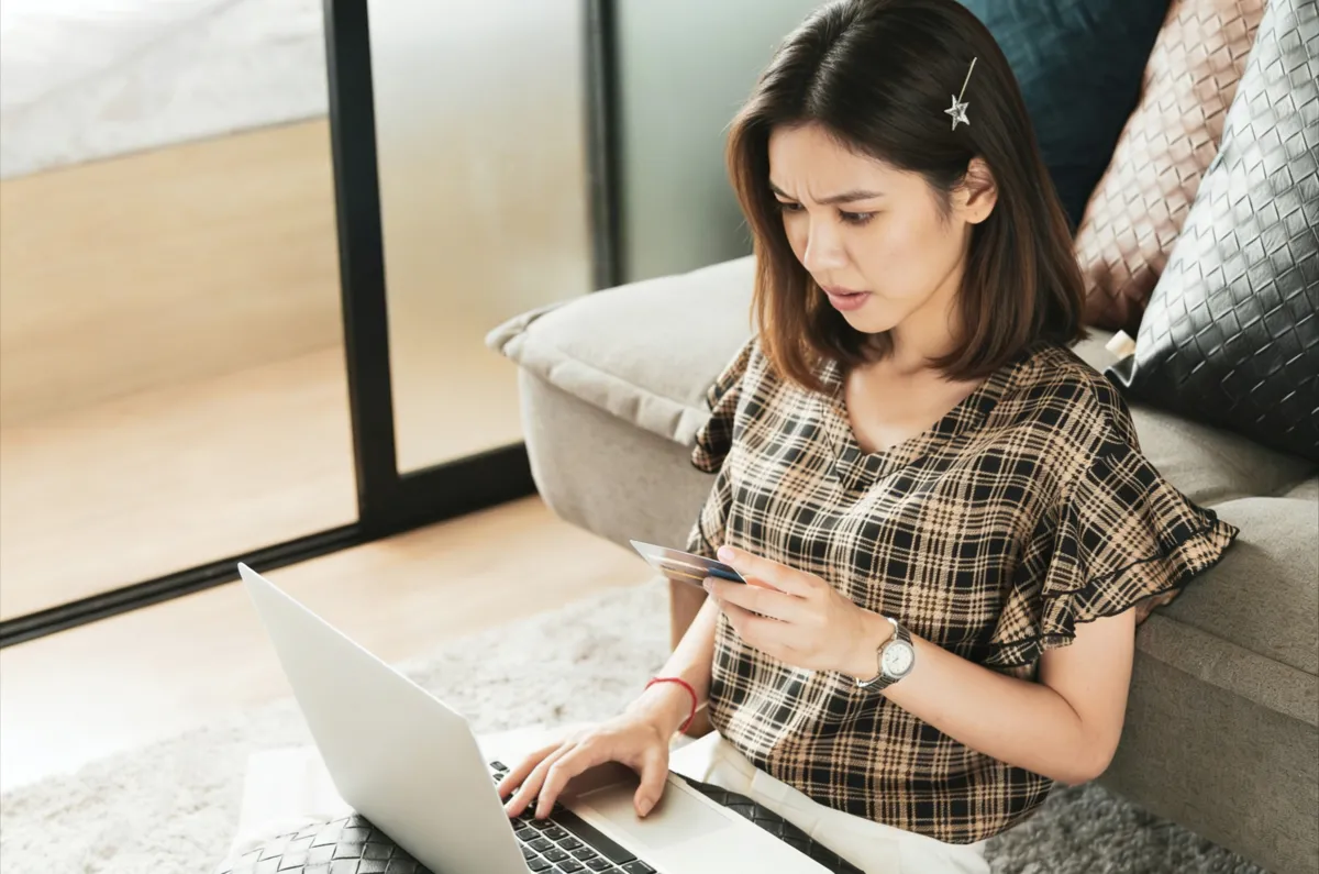 Webstore visitor struggling with a confusing shopping experience and checkout friction during an online purchase.